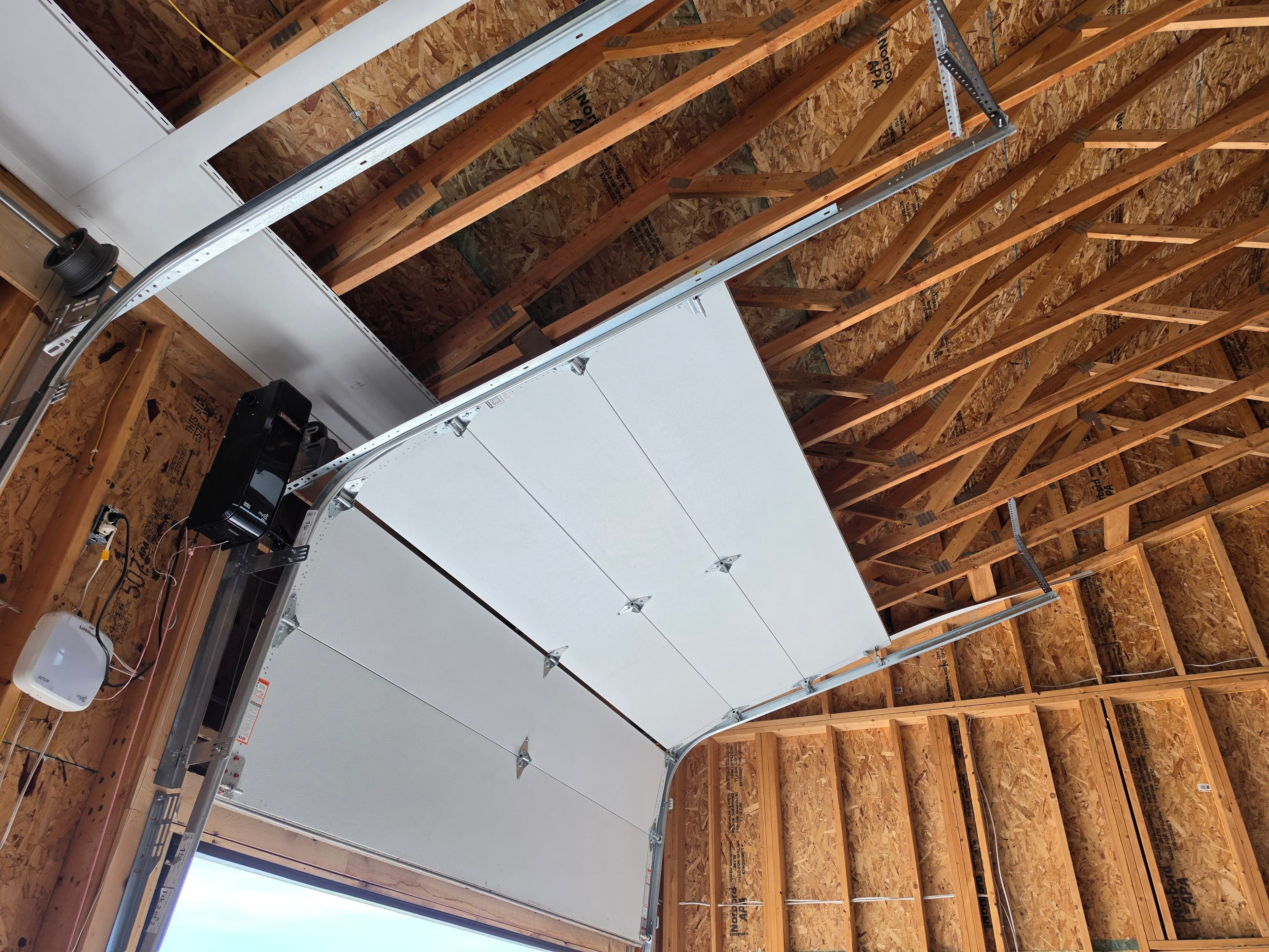 Project High-Lift Garage Door Setup That Puts Your Ceiling Space to Work image