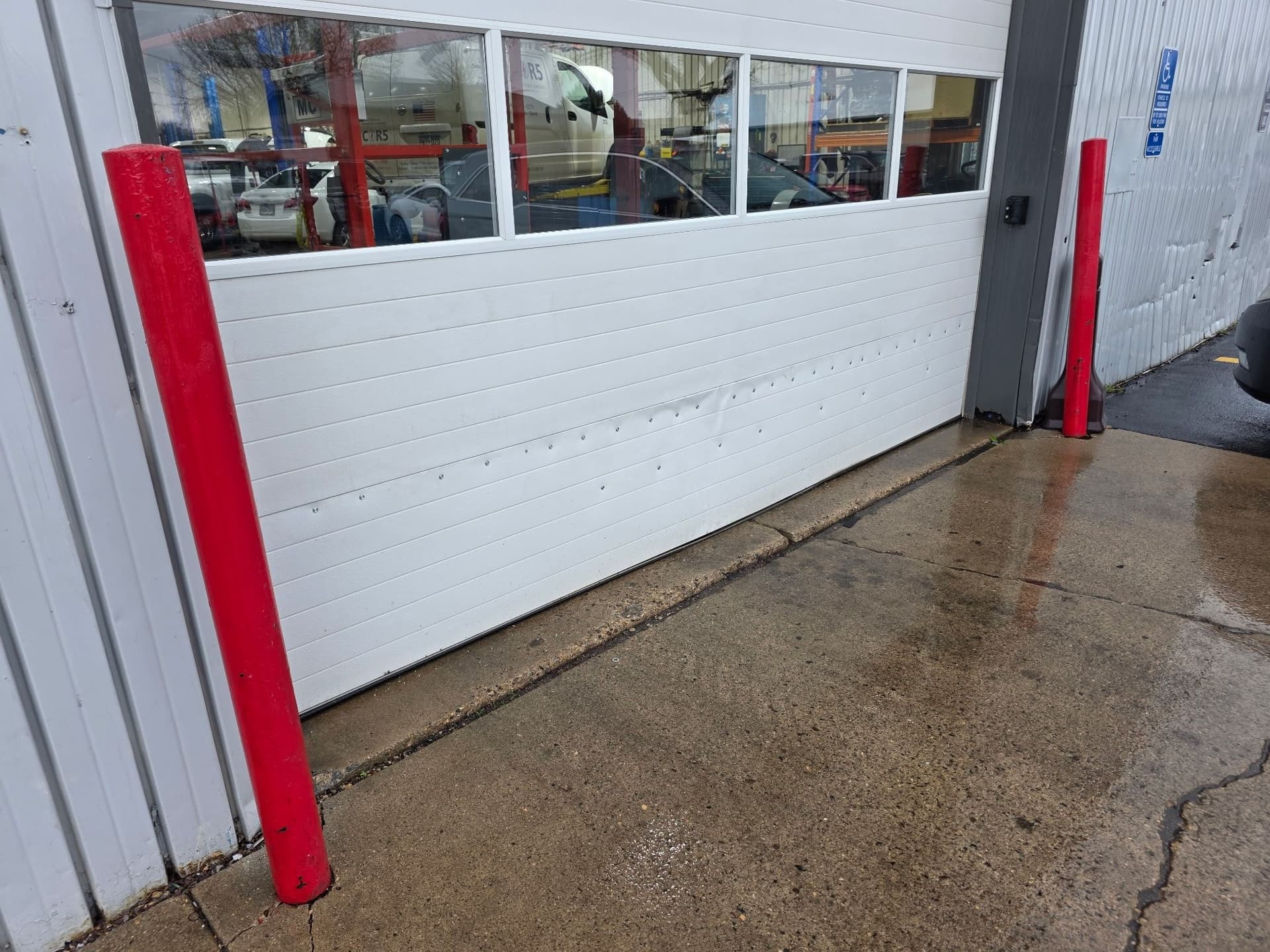 Gallery photos for Car Hit This Garage Door - Here's What a Temporary Fix Looks Like: Image #2