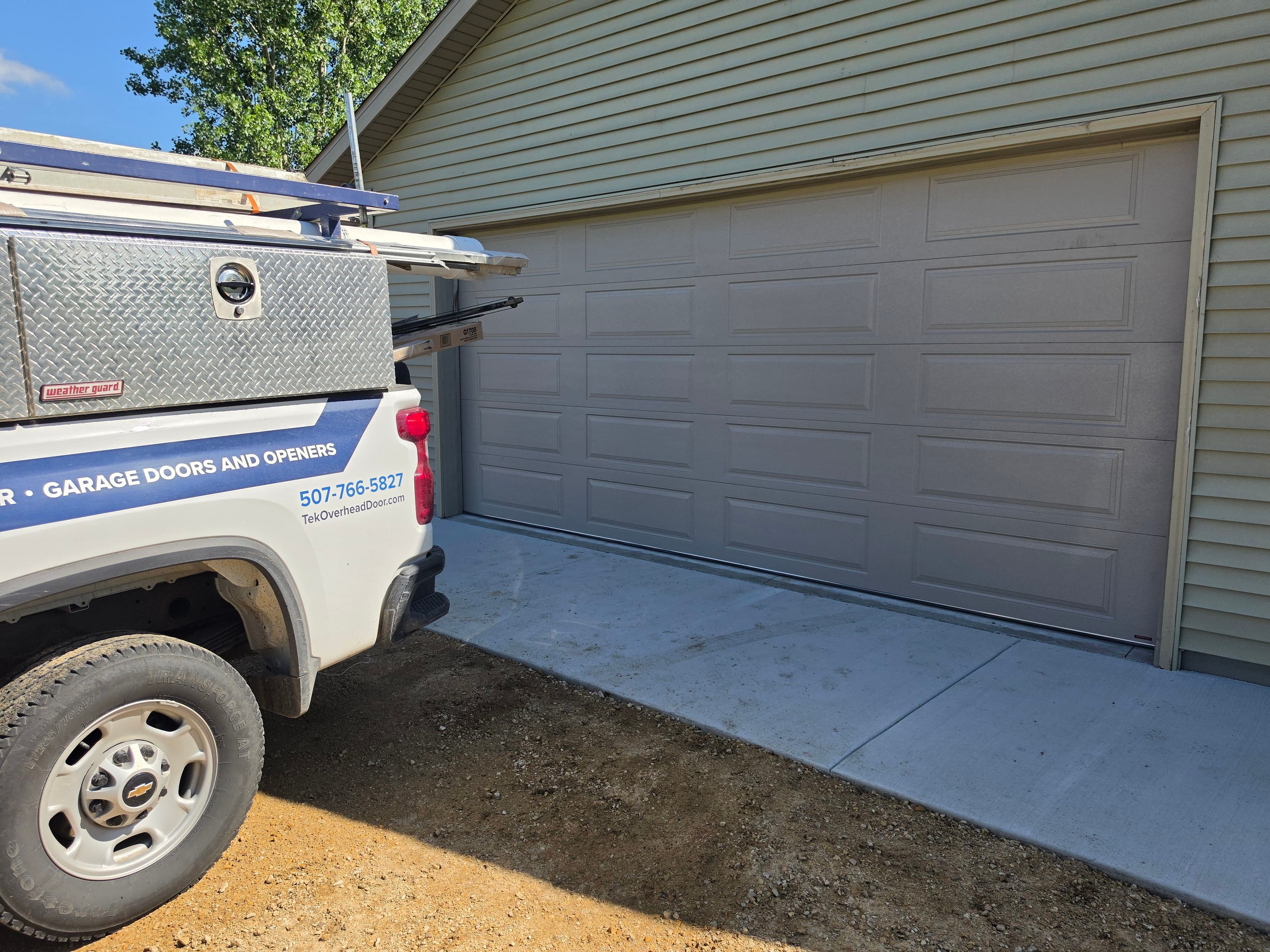 Project Fresh Hormann 4400 Garage Door Install with a Clean Sandstone Finish image