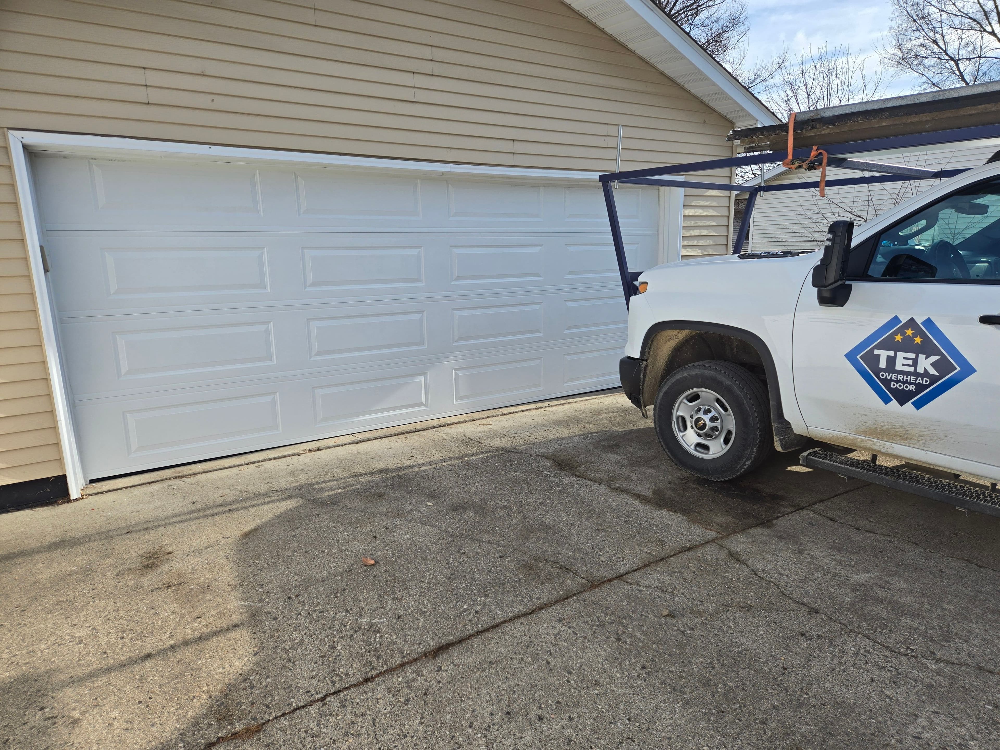 Project Garage Door Upgrade Featuring New Steel Panels image