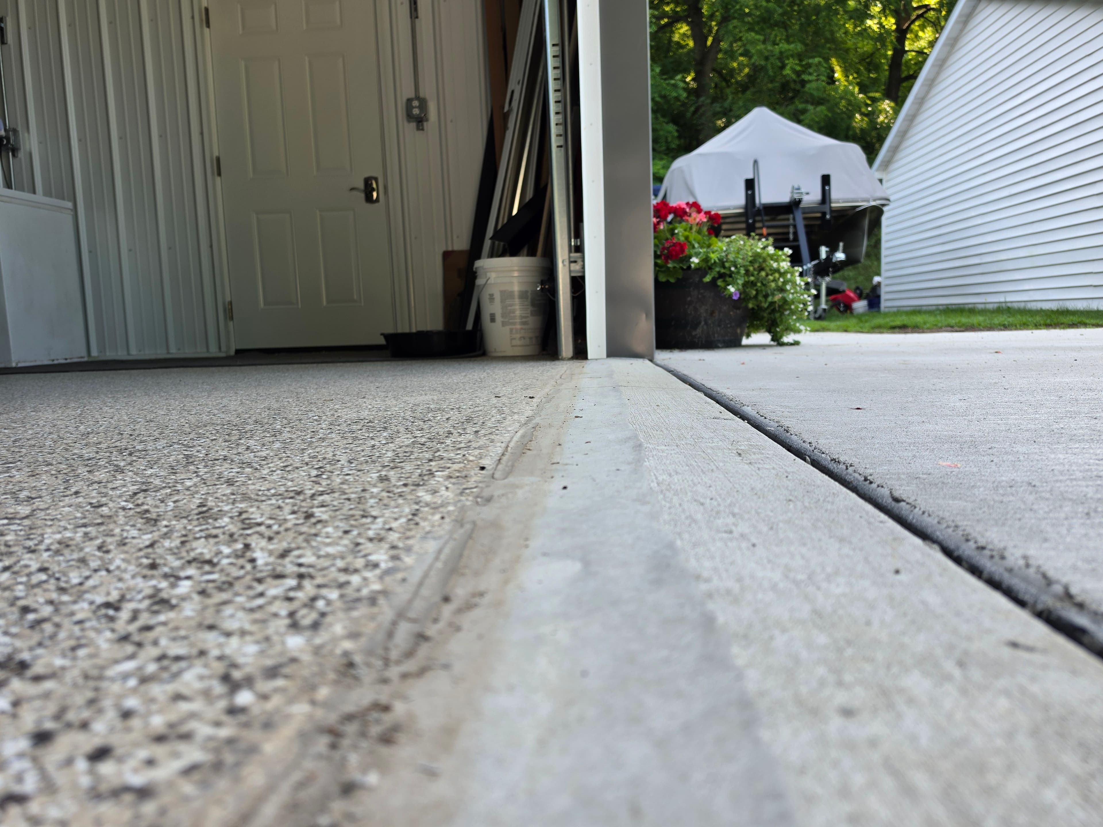 Project Water Under Your Garage Door Might Not Be a Seal Problem image