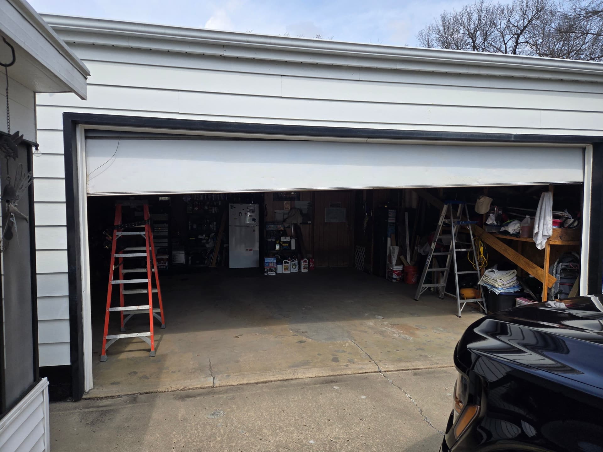 Why You Should Never DIY a Broken Garage Door image