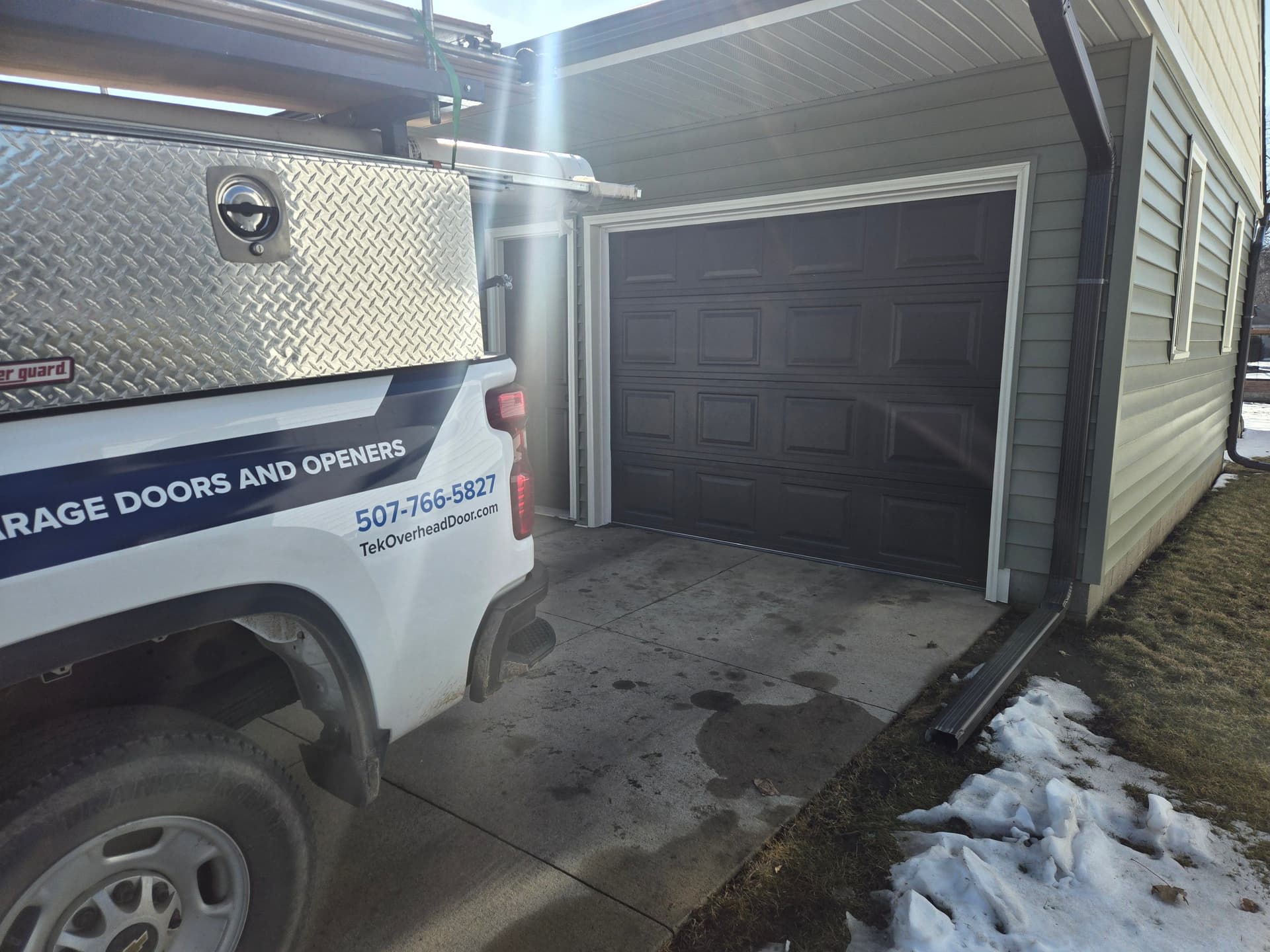 9x7 Brown Garage Door Installation for All Seasons image