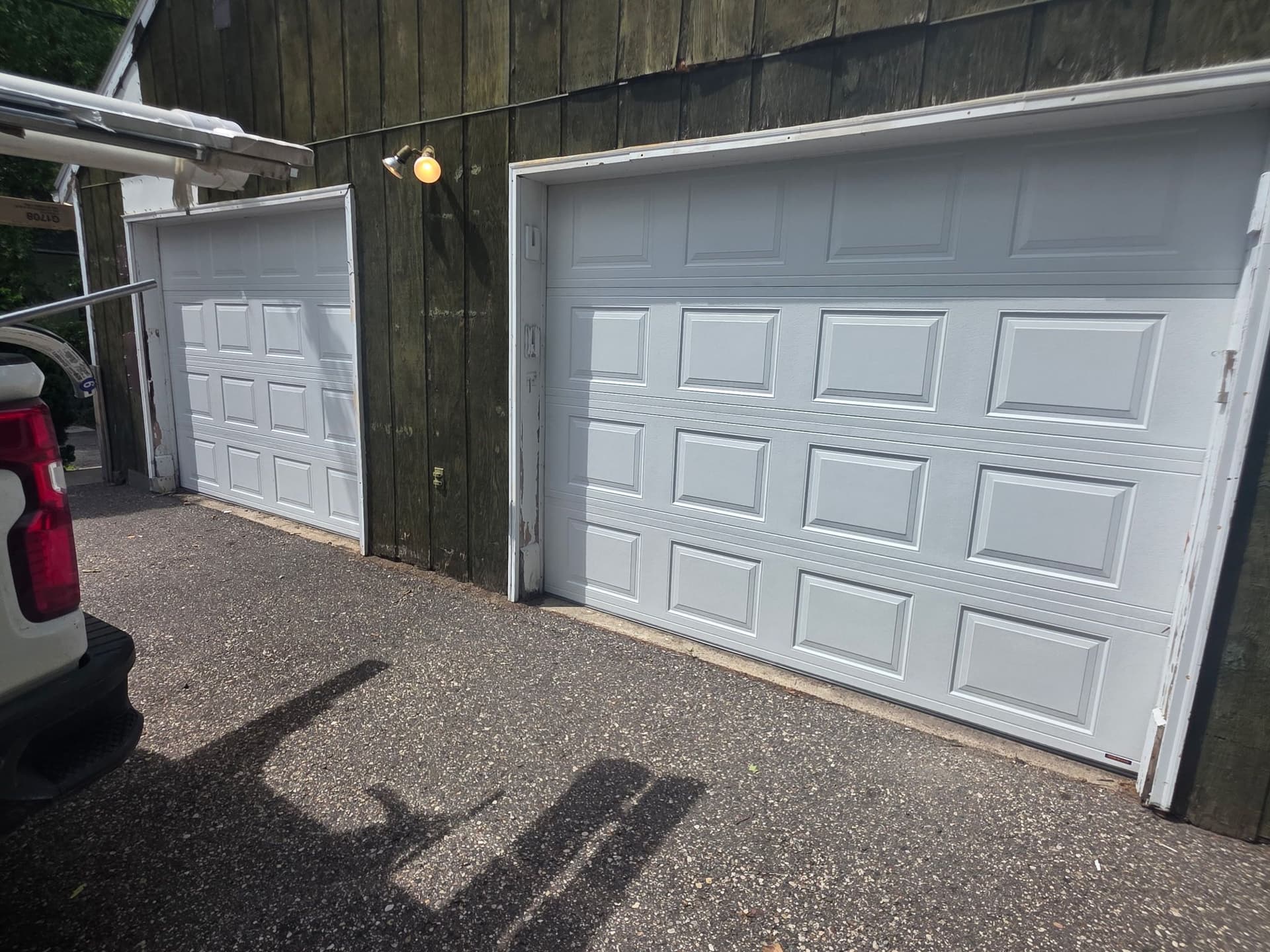 Gallery photos for Two Old Wood Doors Out, Two Insulated Hörmann Doors In: Image #1