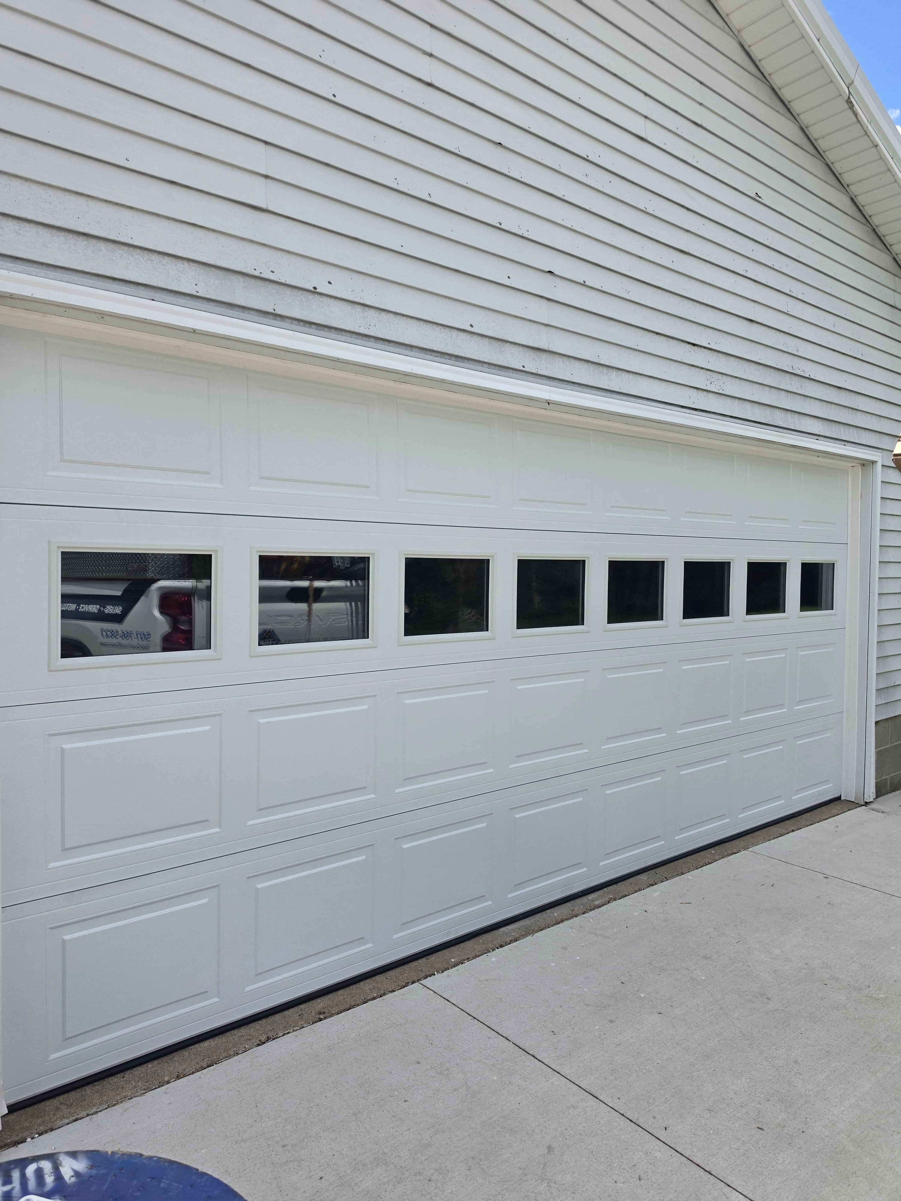 Project A 16x7 Garage Door with Windows That Actually Changes How the Space Feels image
