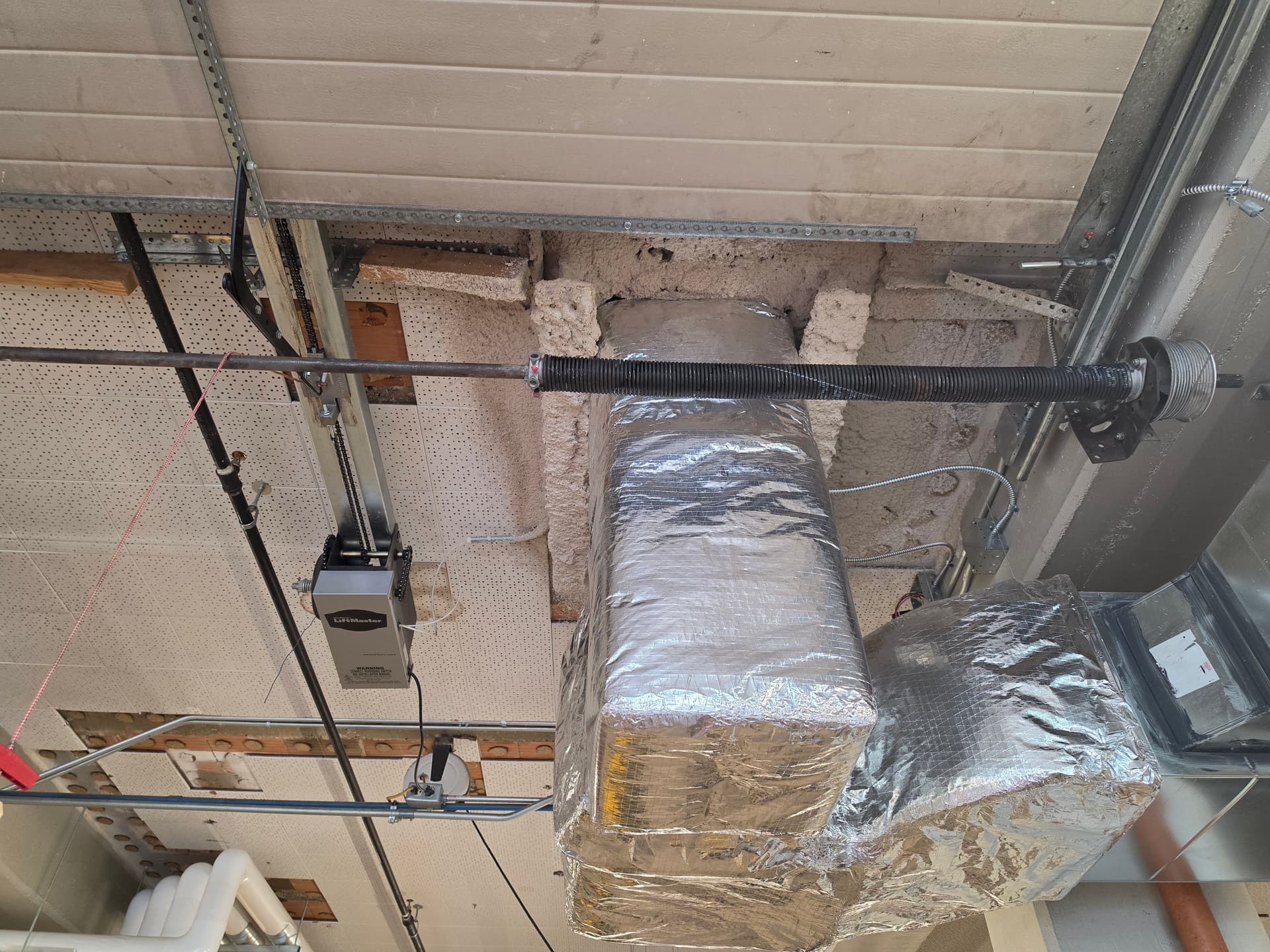 Gallery photos for Commercial Garage Door Opener and Spring Install in a Tight Overhead Space: Image #1