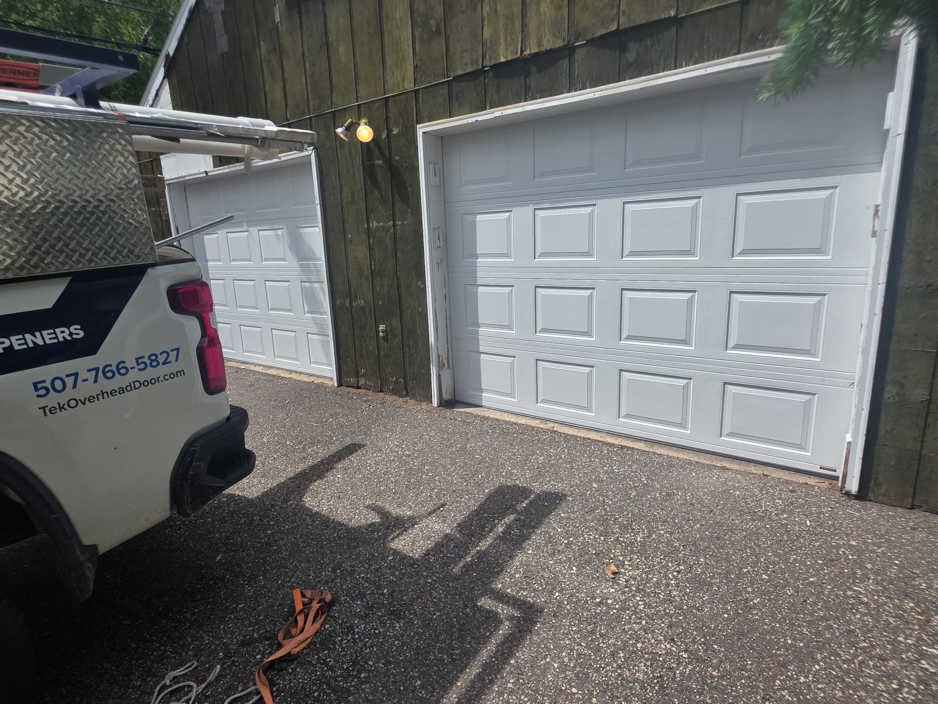 Two Old Wood Doors Out, Two Insulated Hörmann Doors In image