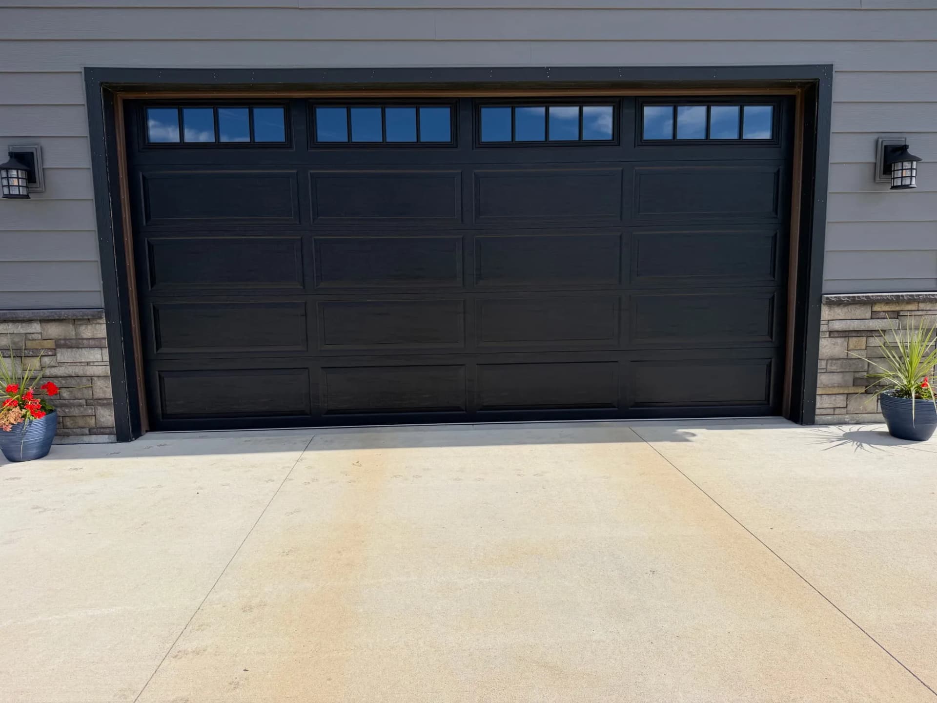 Gallery photos for Black Long Raised Panel Door with Commercial Opener Install: Image #1