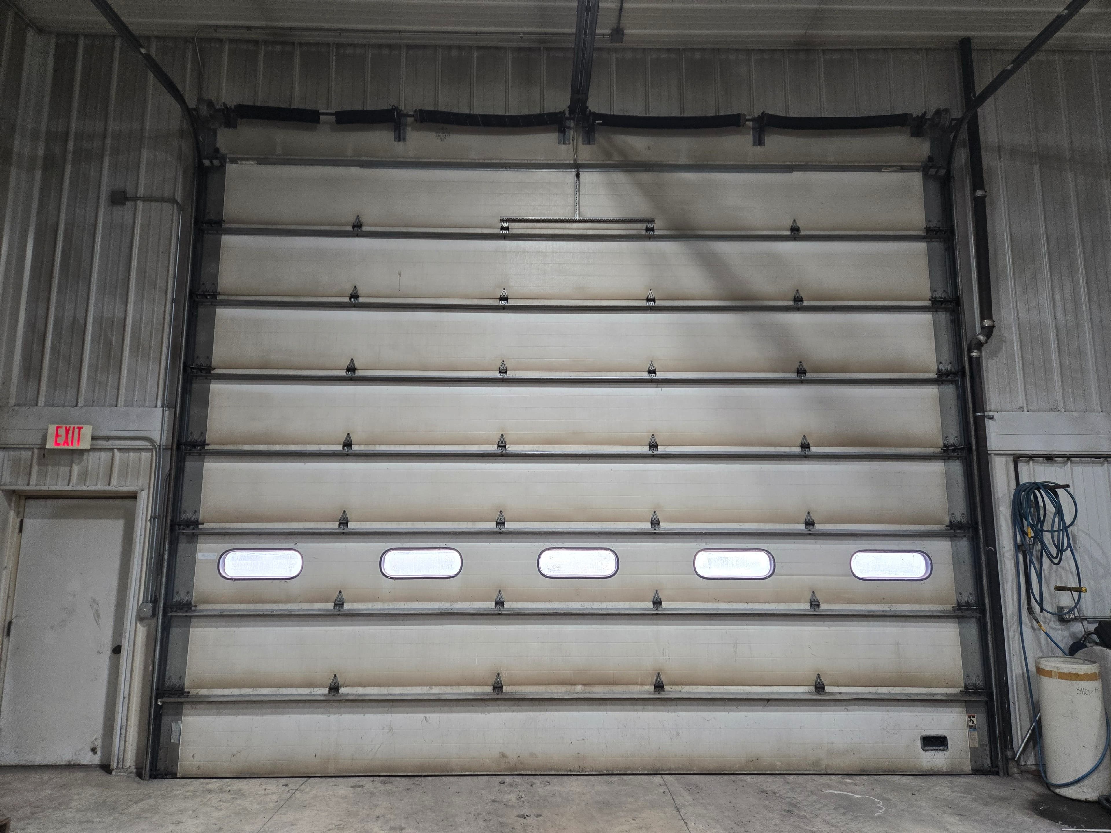 Project Broken Spring on a Massive Commercial Overhead Door image