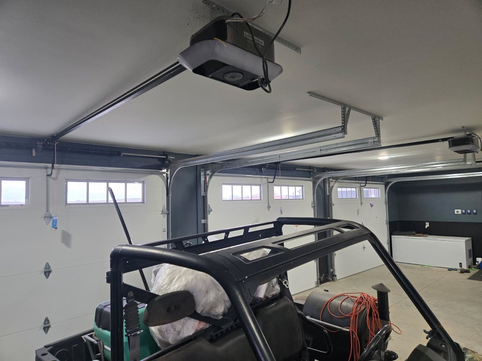 Project Triple Garage Door Makeover with Reliable Openers image