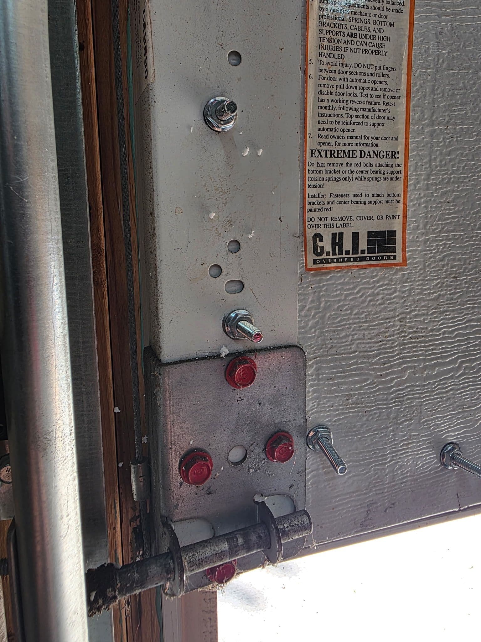 Gallery photos for What a Hit Garage Door Actually Does to Your Hardware: Image #1