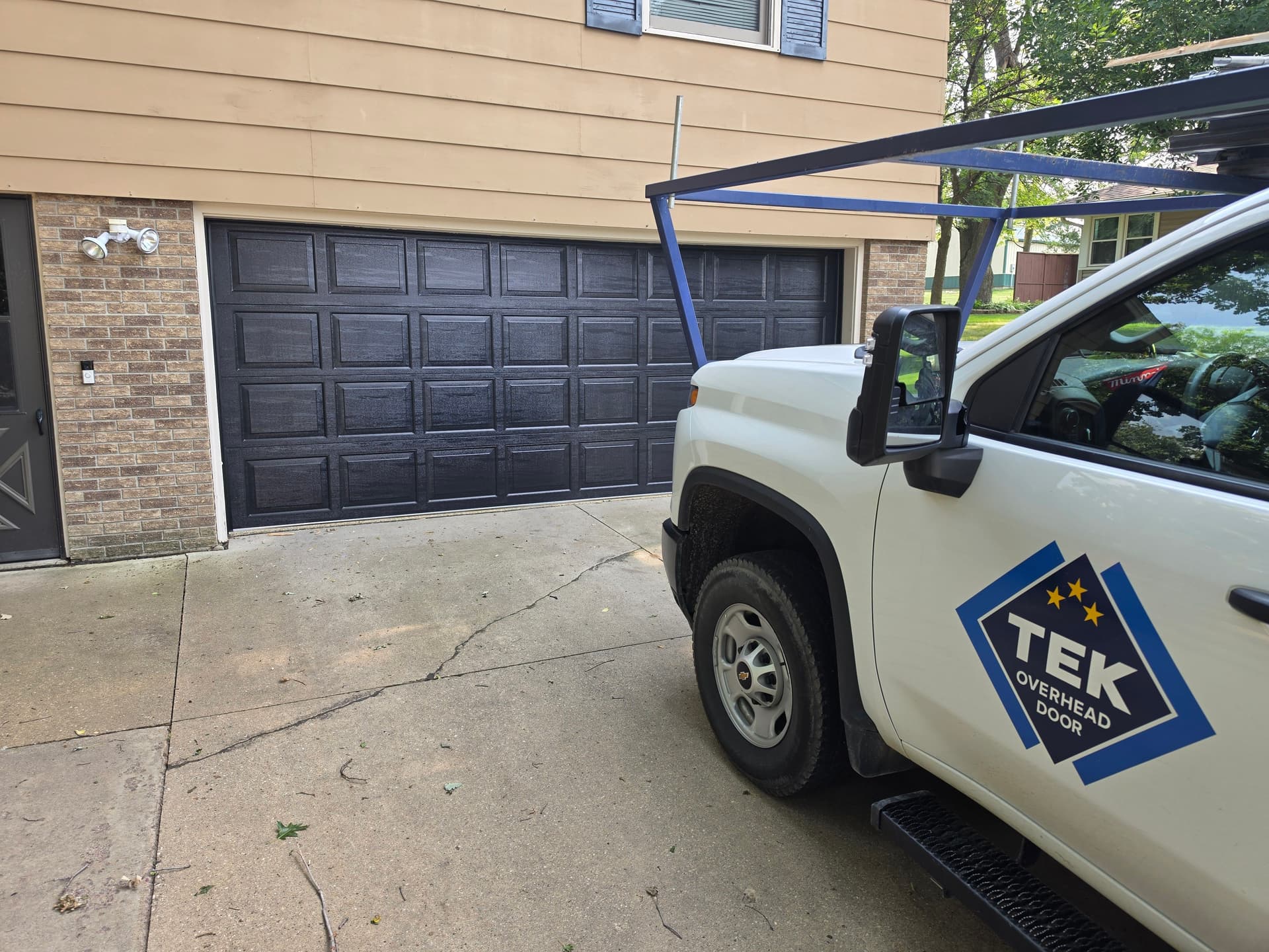 Gallery photos for Black AP200 Garage Door Installation That Nails Curb Appeal: Image #1