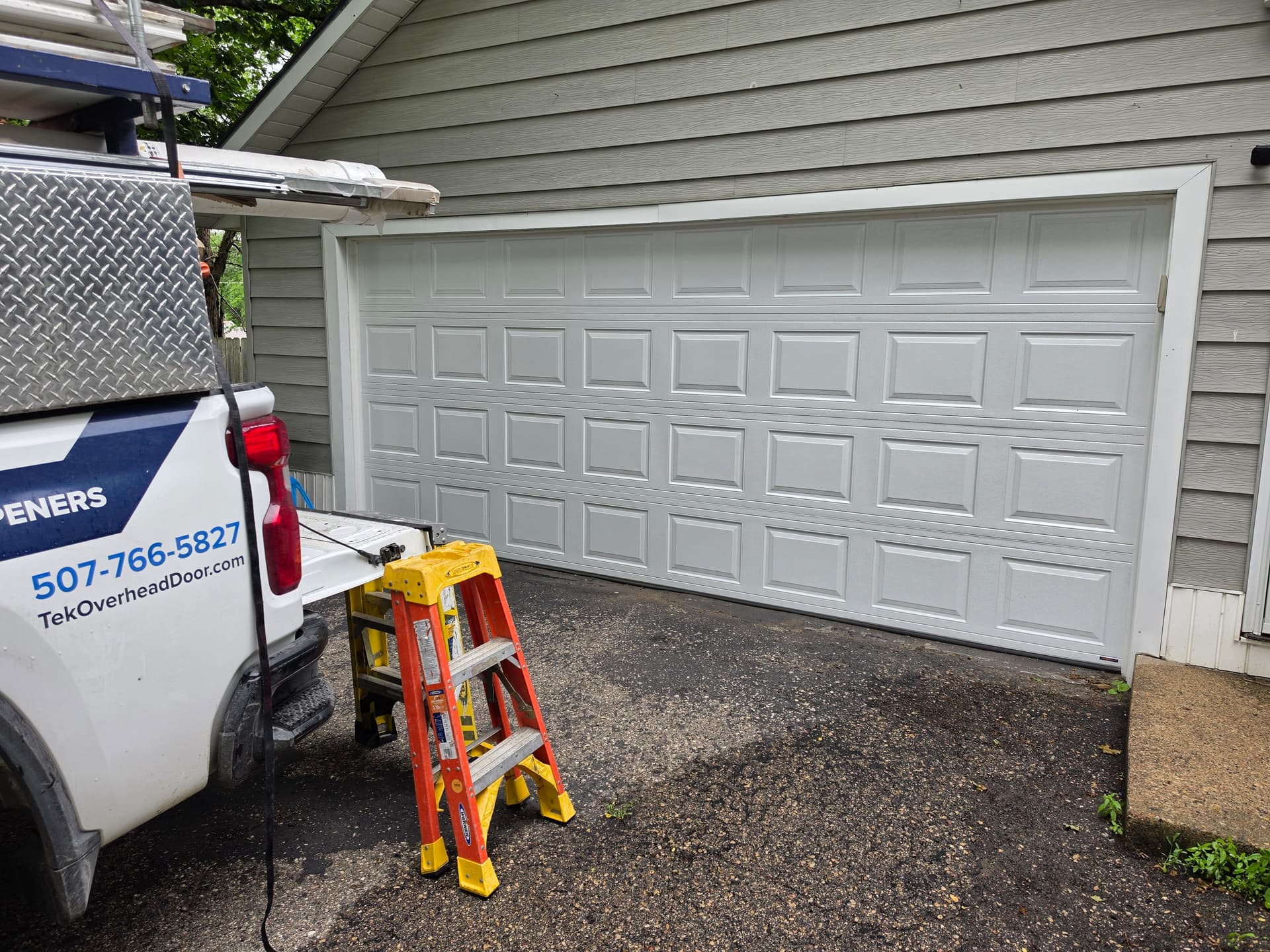 Gallery photos for Fresh Garage Door Installation with a Classic White Panel Design: Image #1